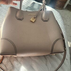 Michael Kors light pink purse with Gold Accents